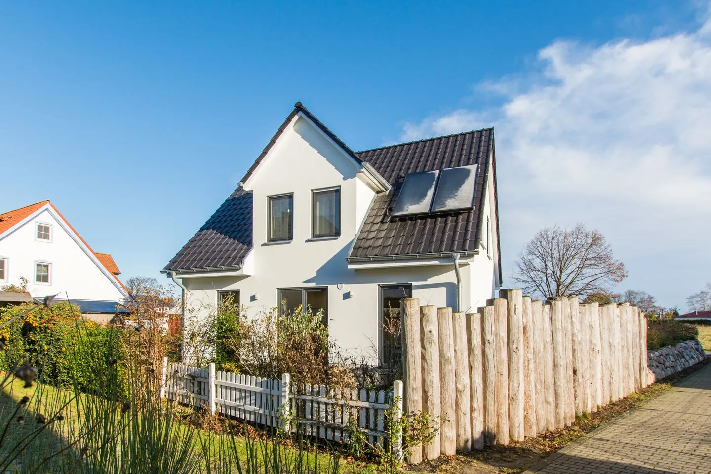 Ferienhaus - Deichweg 10 Ostseeheilbad Zingst - Aussenansicht mit Terrasse