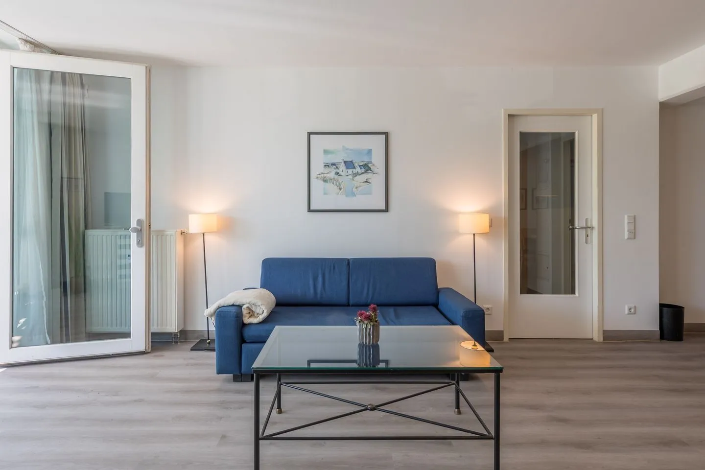 Seebär Zingst - Ferienwohnung Seebär in Zingst Blick auf die Couch im Wohnzimmer