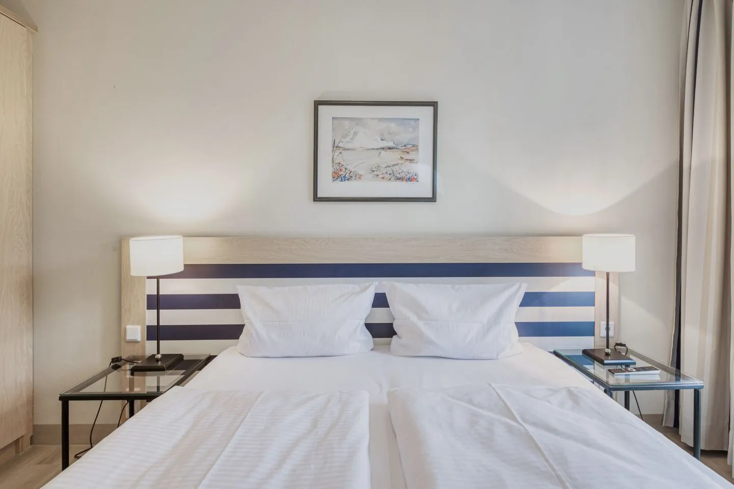 Ostseeanker Zingst - Ferienwohnung Ostseeanker in Zingst gemütliches Doppelbett im Schlafzimmer