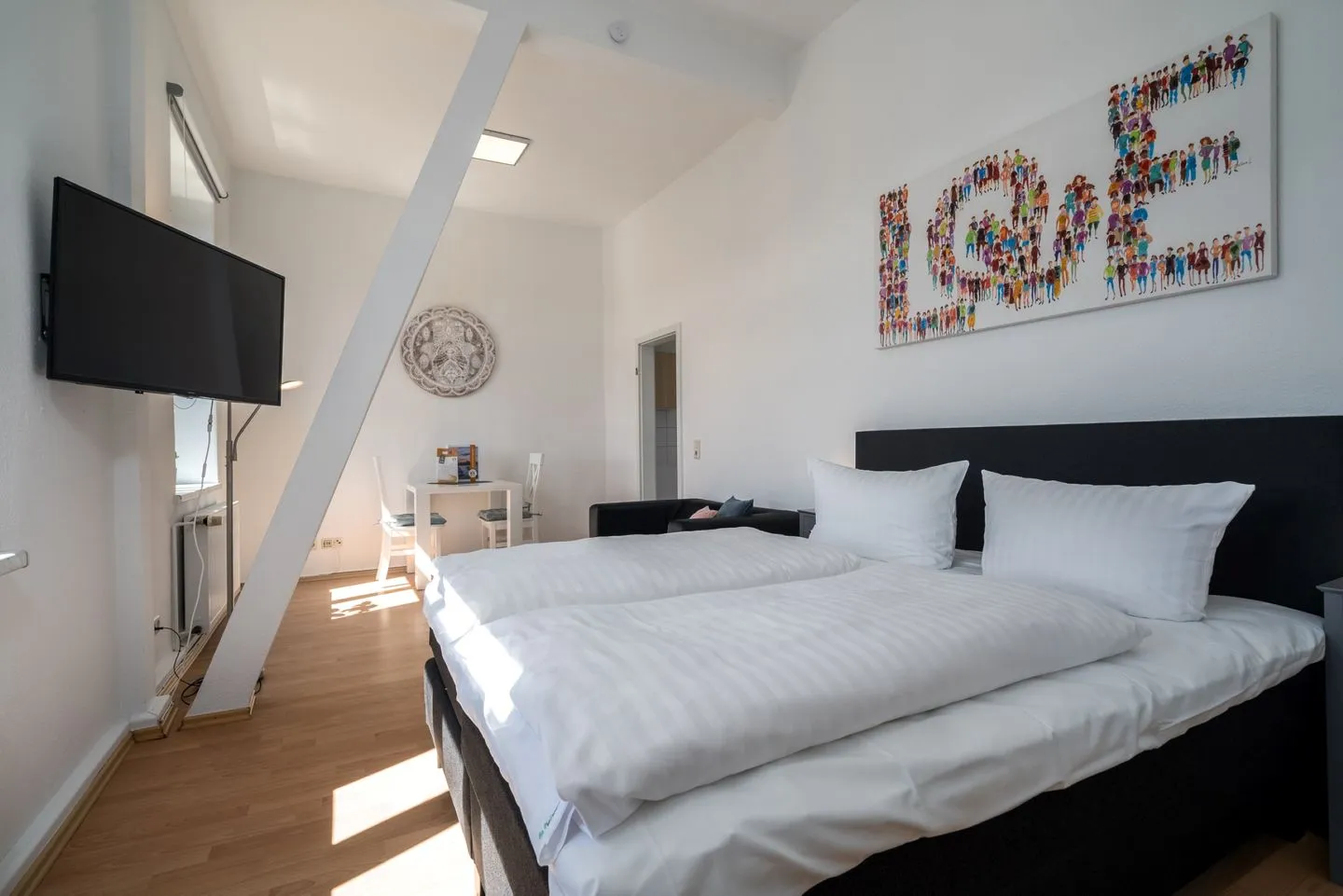 SeaLove Malchow - Ferienwohnung SeaLove in Malchow Bett im offenen Schlafbereich
