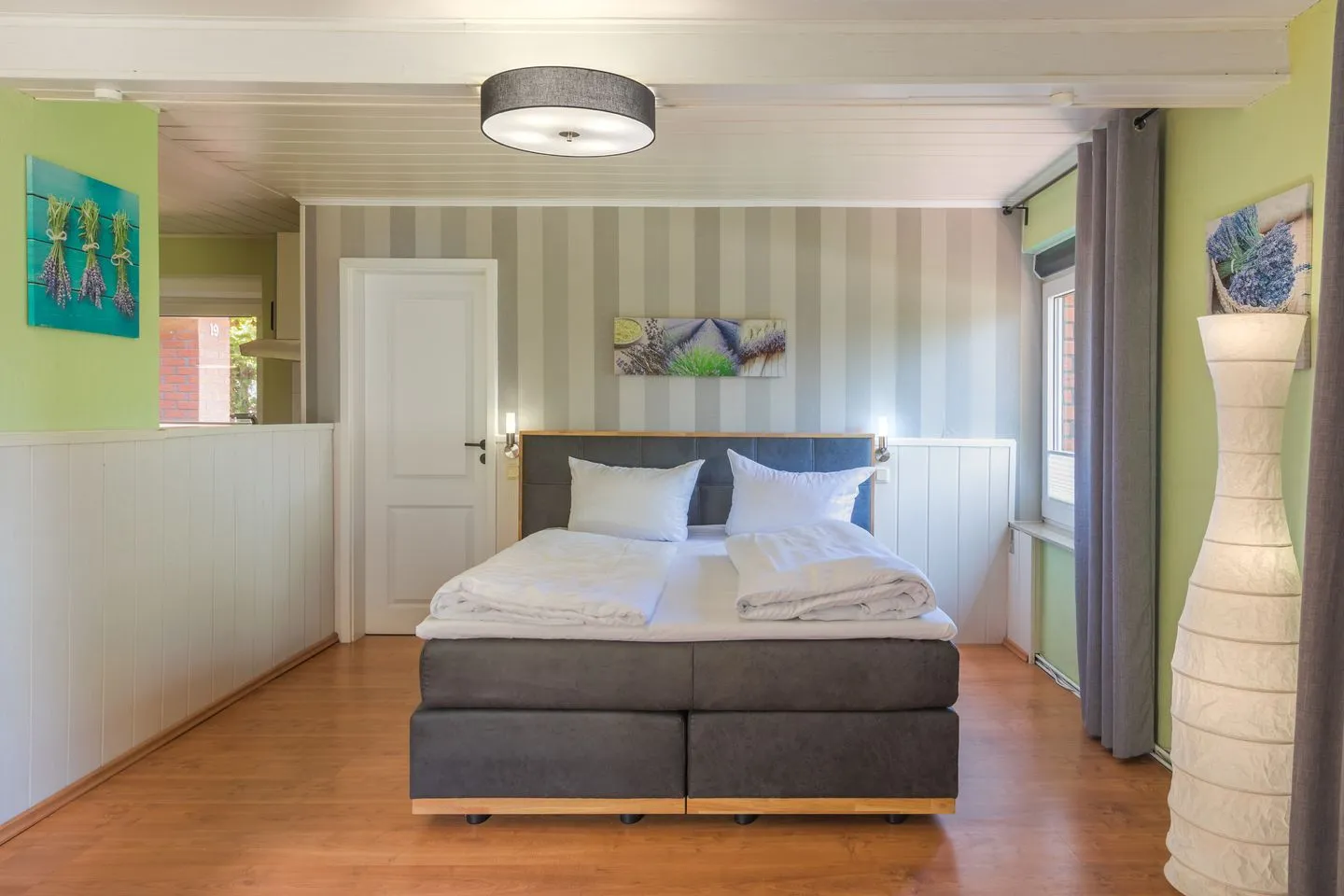 Marienkäfer Waren (Müritz) - Ferienwohnung Marienkäfer Waren mit Boxspringbett