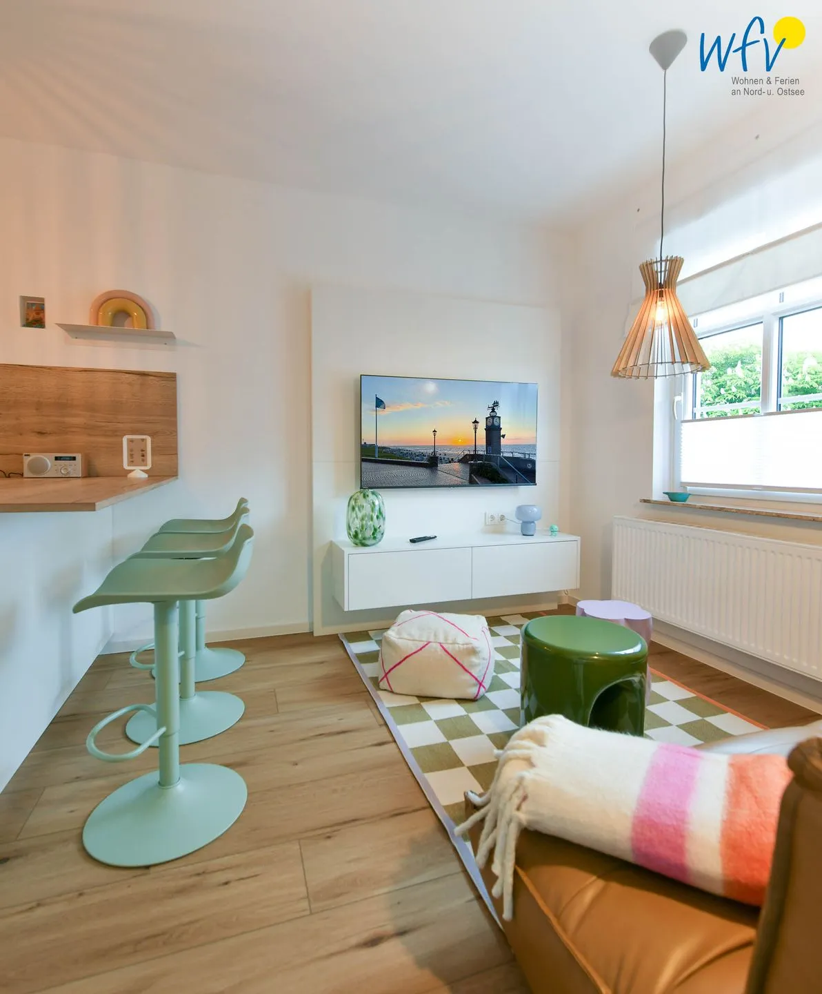 Haus am Dorfbrunnen Ferienwohnung Strandfloh Wangerooge - Wohnzimmer