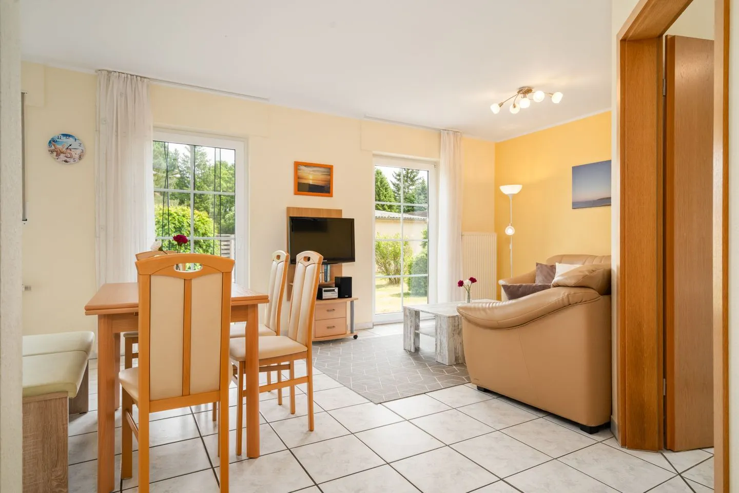 Schwanensee Plauer See - Ferienhaus Schwanensee Ferienpark Lenzer Höh offener Wohnbereich