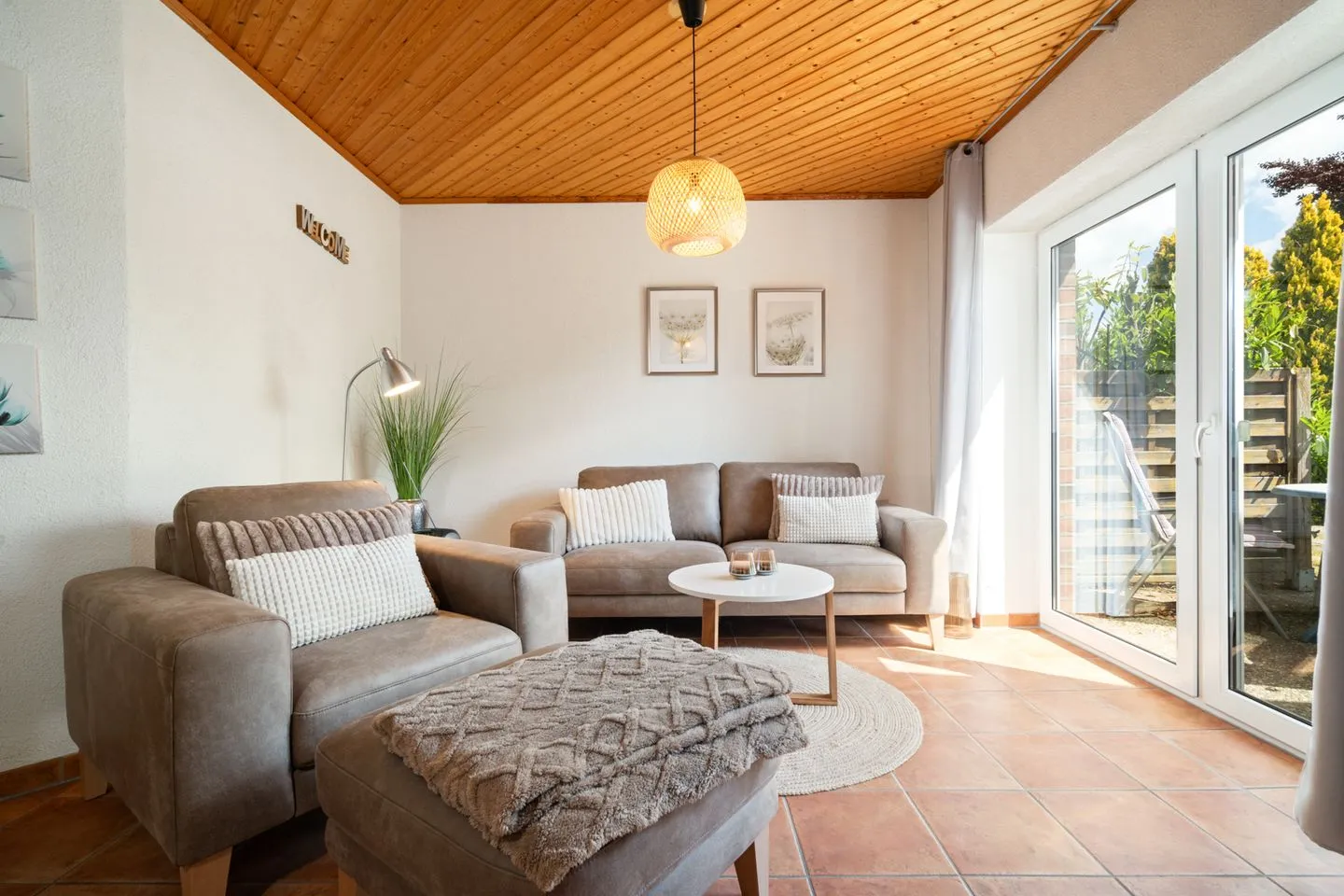 Blumenhaus Waren (Müritz) - Blumenhaus Waren Wohnzimmer mit Terrassen Zugang
