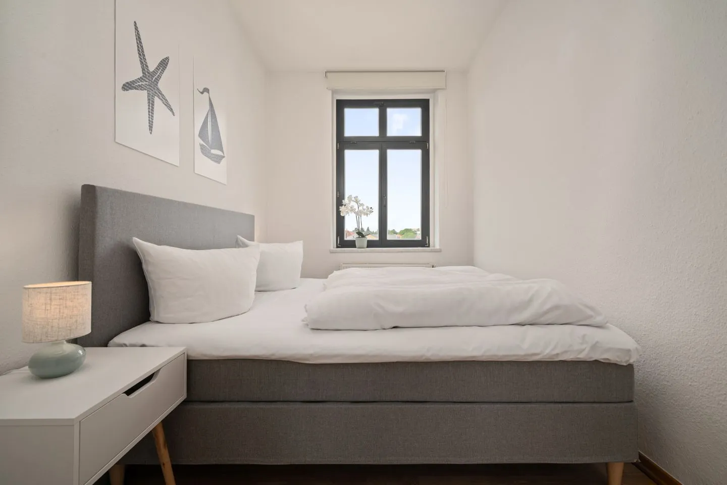 SeaView Malchow - Ferienwohnung SeaView Malchow Schlafzimmer mit Boxspringbett