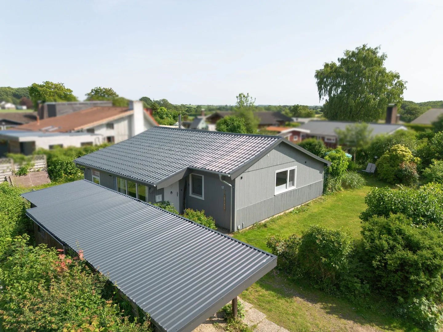 VITA Sonnholm Flensburger Förde - Das Ferienhaus VITA mit Garten