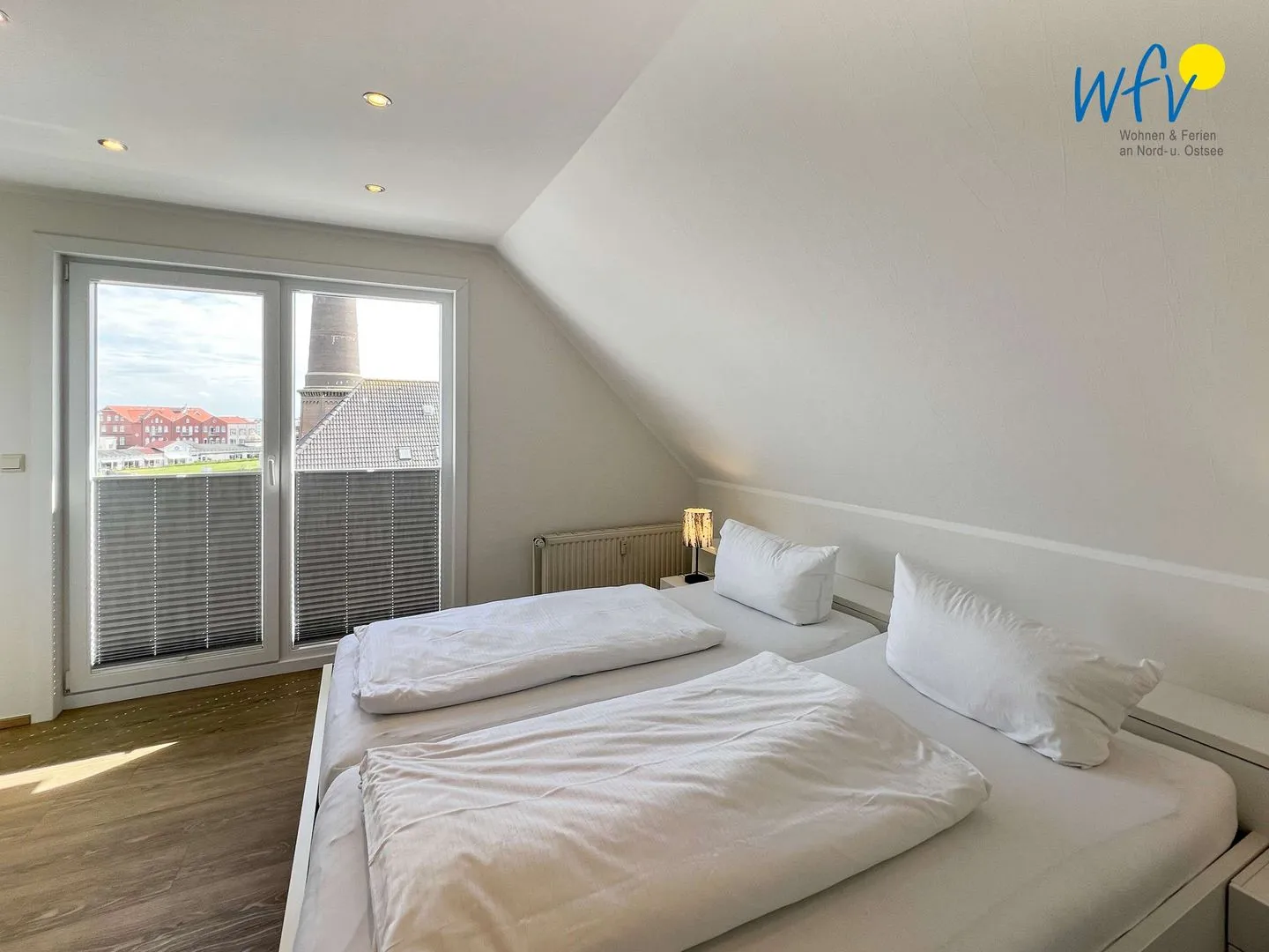 Apartmenthaus Roberta Ferienwohnung Meerblick Borkum - Schlafzimmer