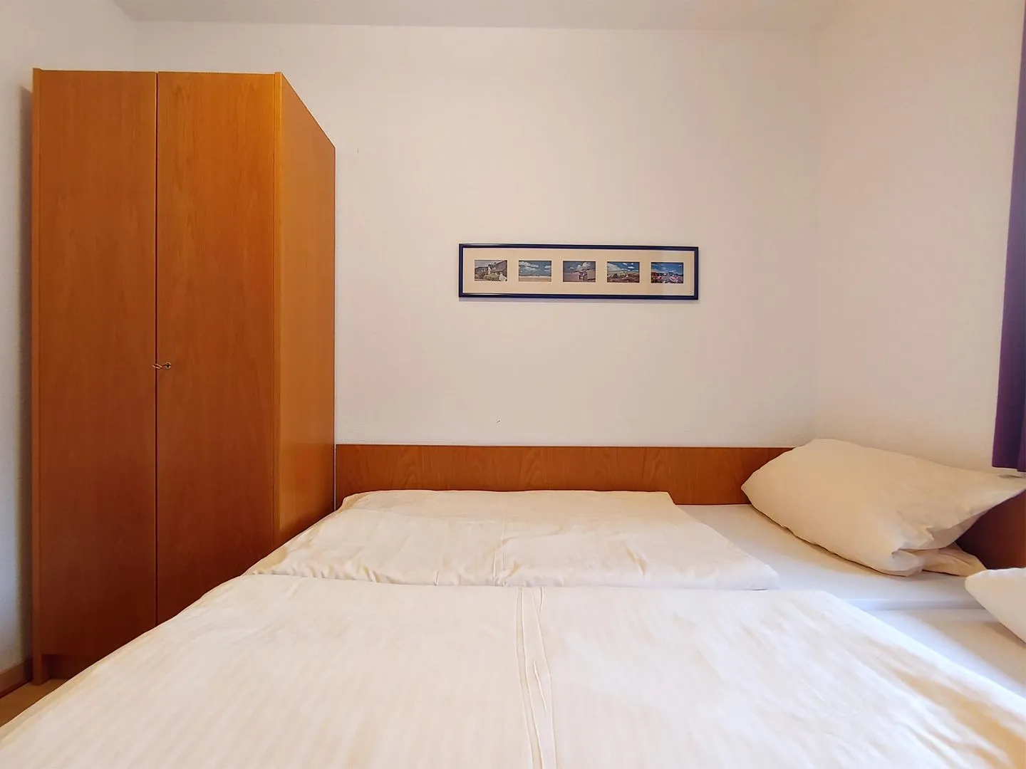 Haus *Südspitze 17* Ferienwohnung *Auszeit am Meer* Wittdün auf Amrum - Schlafzimmer in der Ferienwohnung Auszeit am Meer in Wittdün auf Amrum