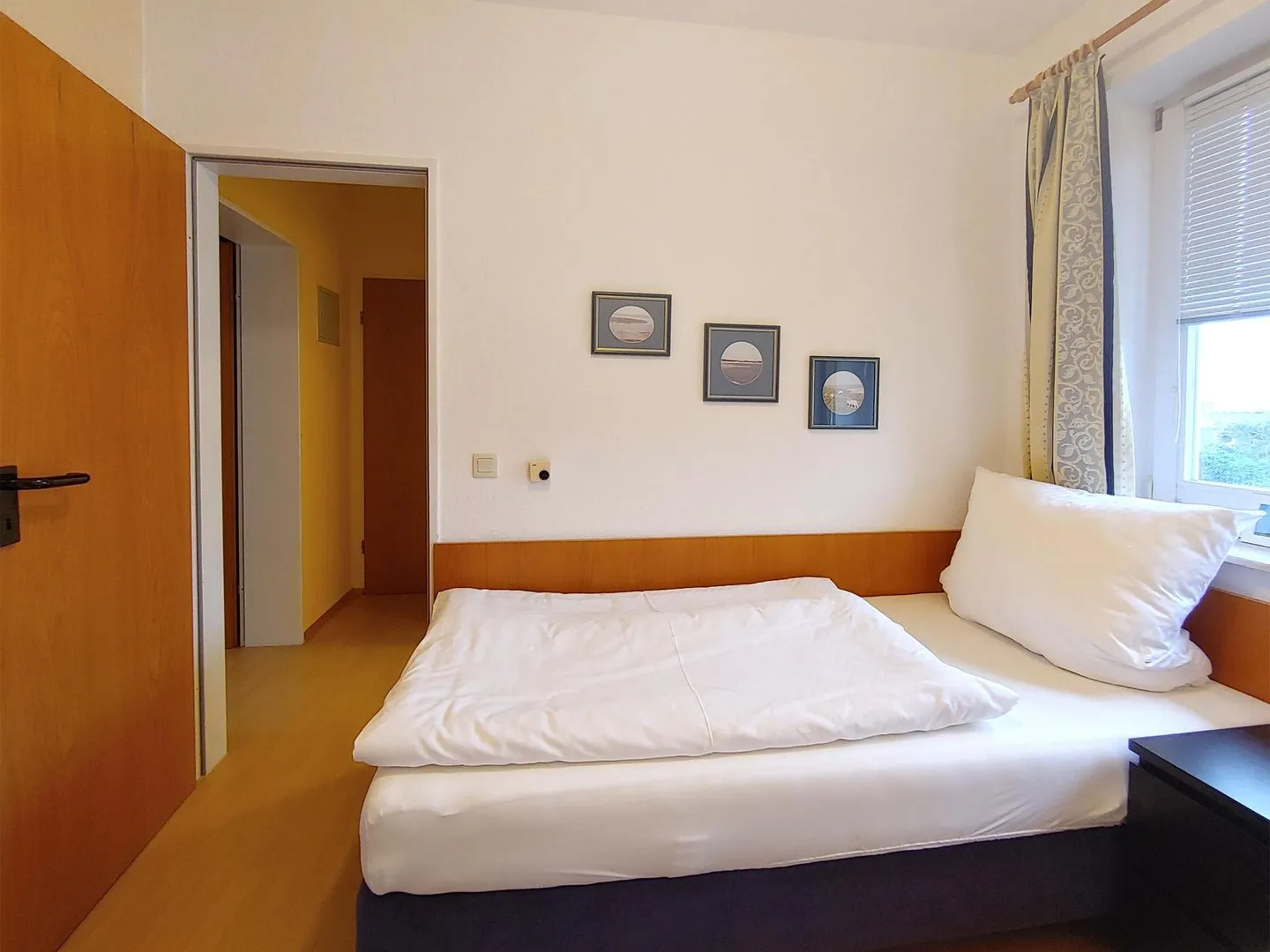 Haus *Südspitze 17* Ferienwohnung *Inselnest am Meer* Wittdün auf Amrum - Schlafzimmer in der Ferienwohnung Inselnest am Meer in Wittdün auf Amrum