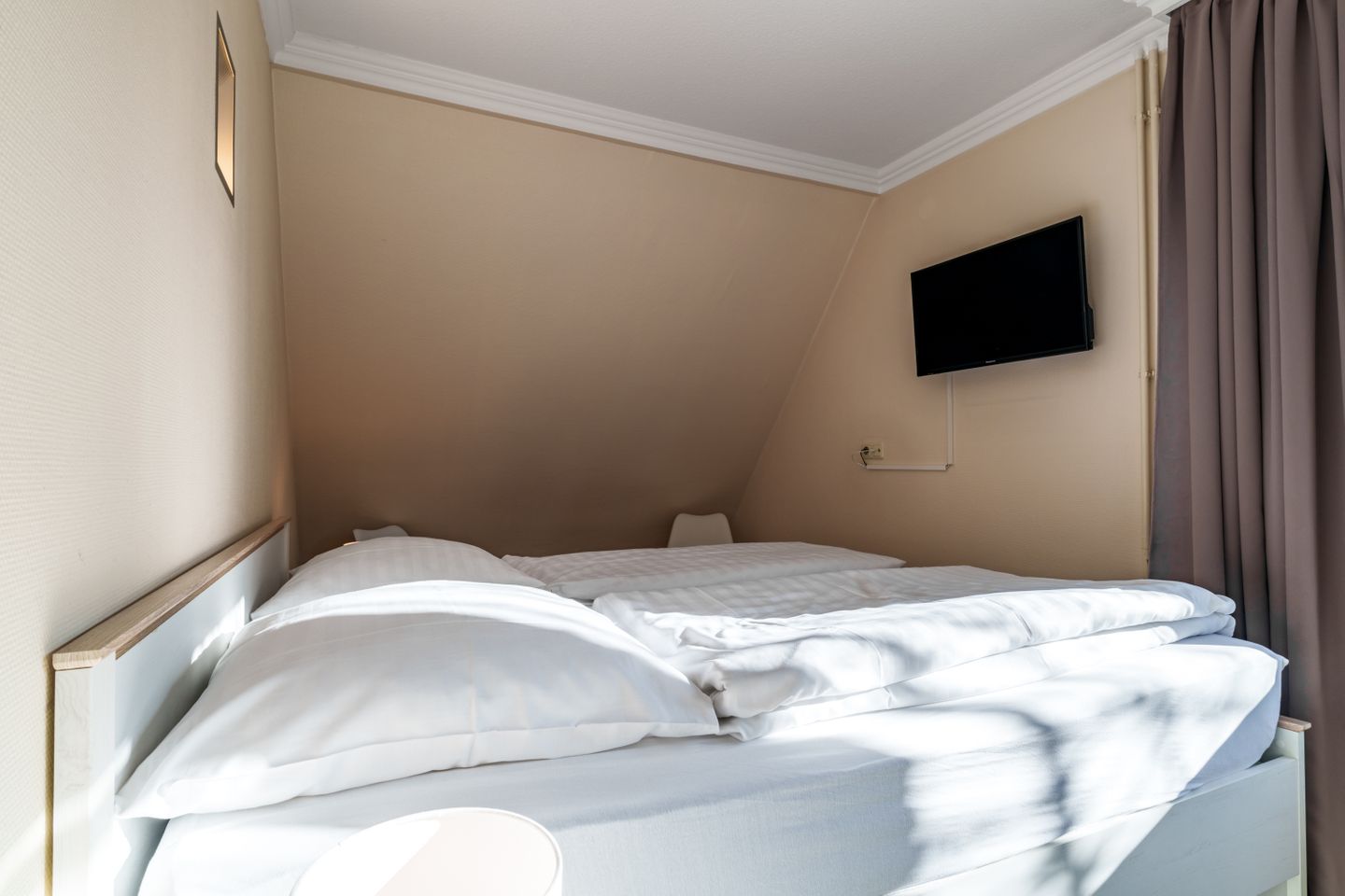 Appartementhaus Meeresbucht Whg. 8, Schlafzimmer mit TV