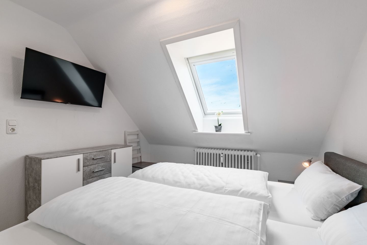 Haus Welle, Whg. Kuschelnest Schlafzimmer mit TV