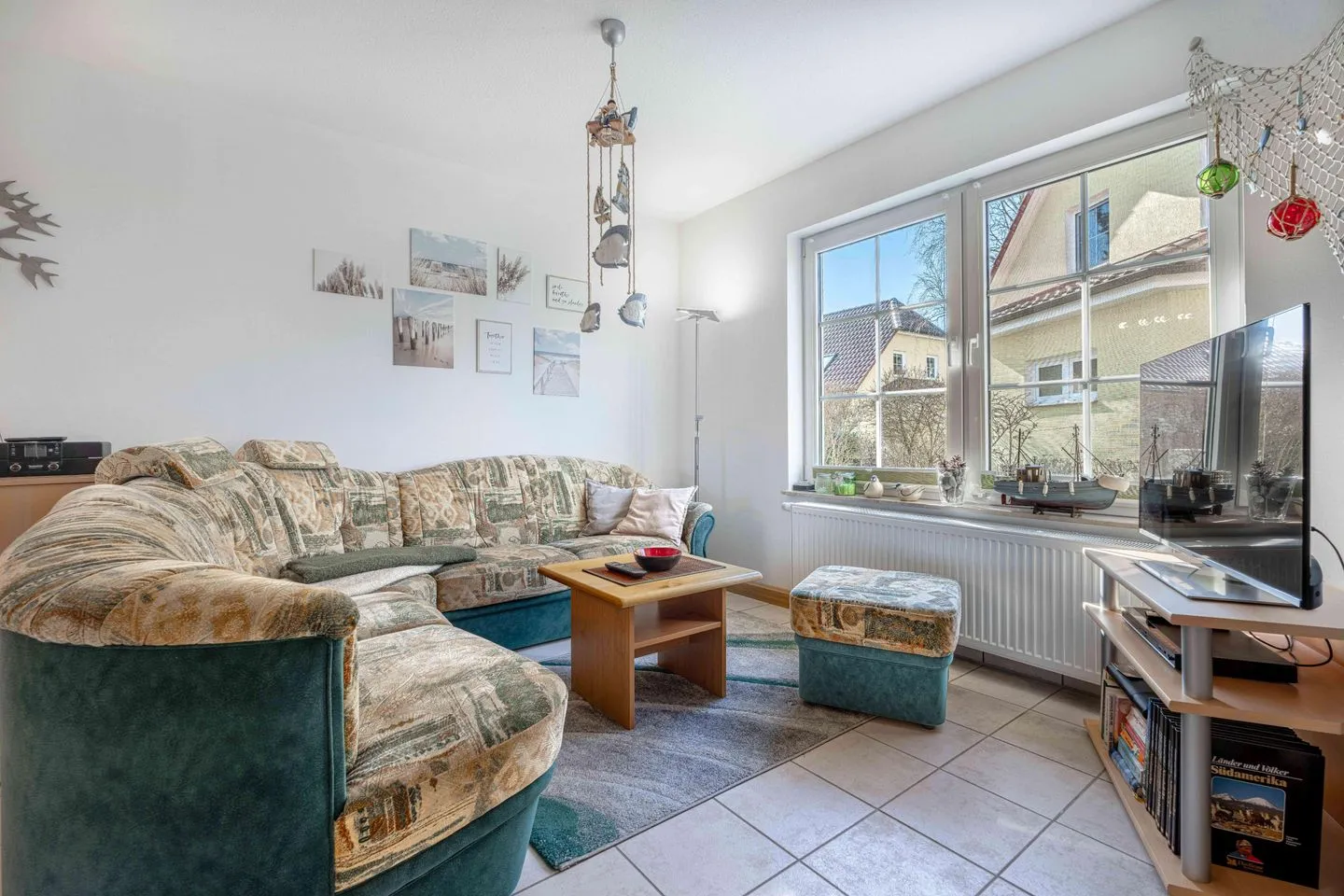 Wohnbereich mit TV  Am Deich Haus 8