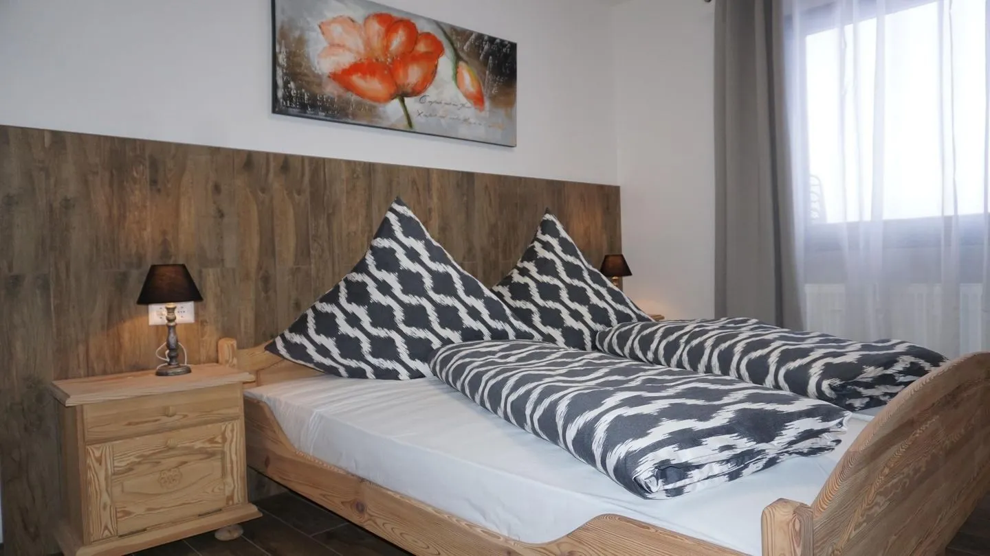 Feriendorf Hochbergle Haus 138 Lechbruck am See - Schlafzimmer