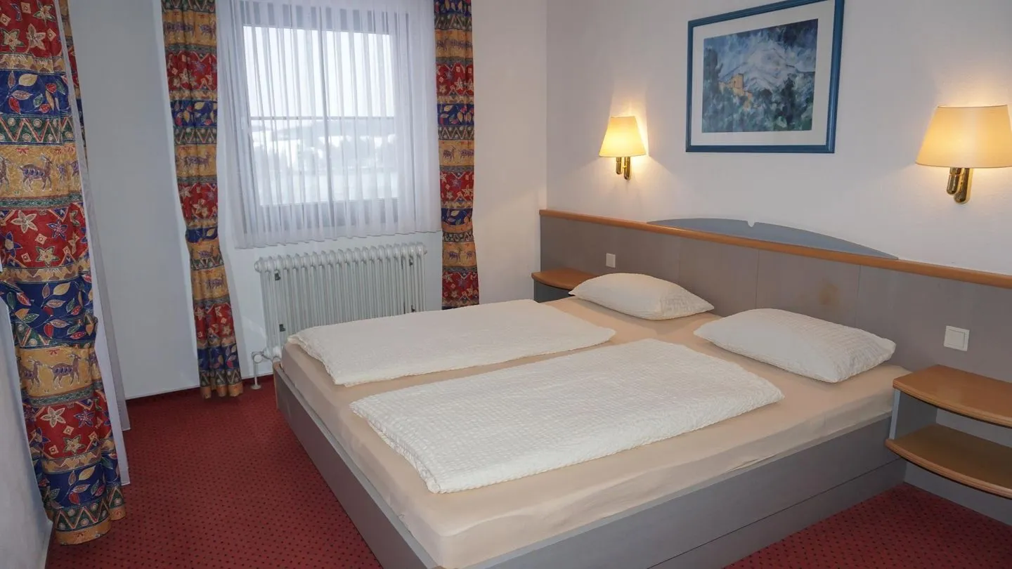 Feriendorf Hochbergle Haus 140 Lechbruck am See - Schlafzimmer