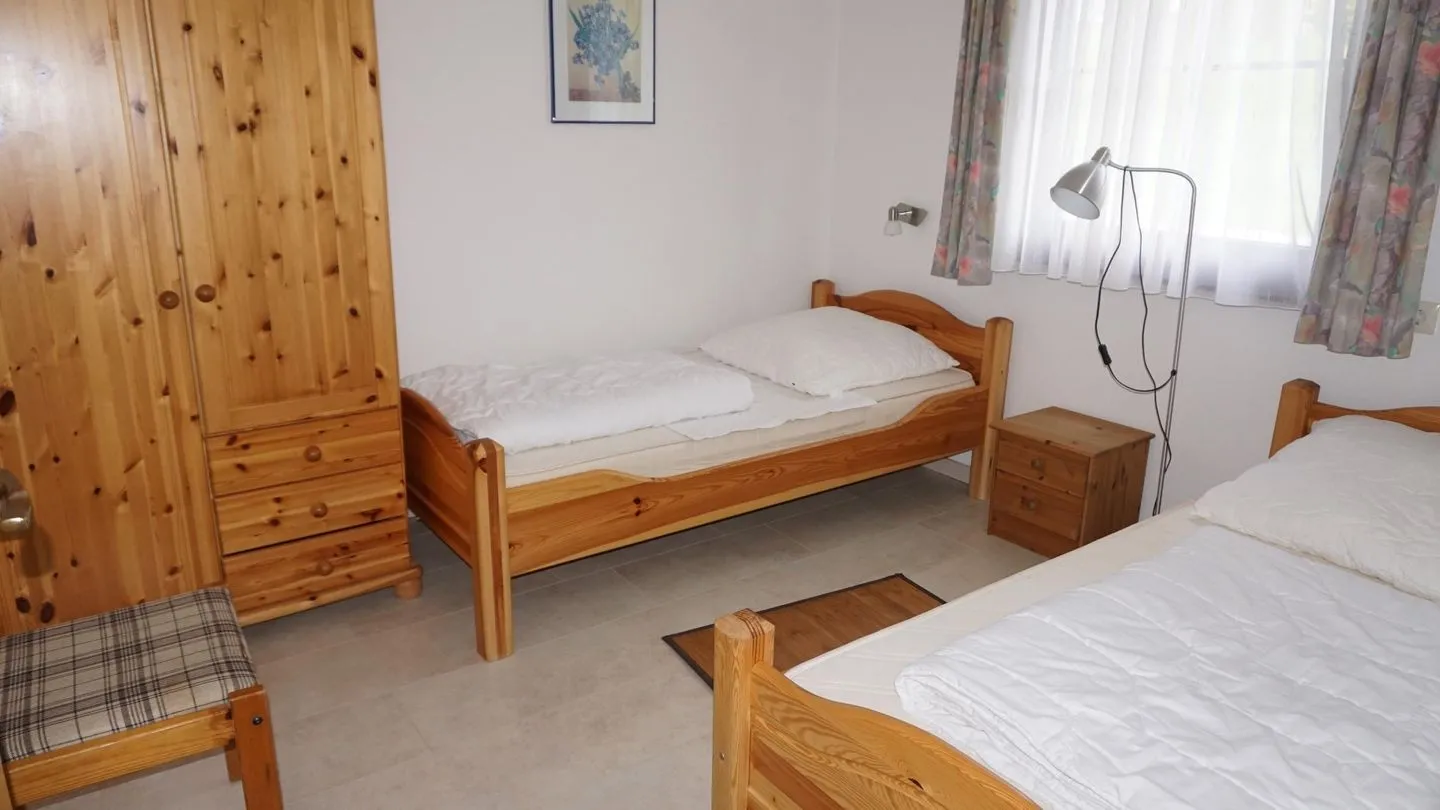 Feriendorf Hochbergle Haus 144 Lechbruck am See - Schlafzimmer