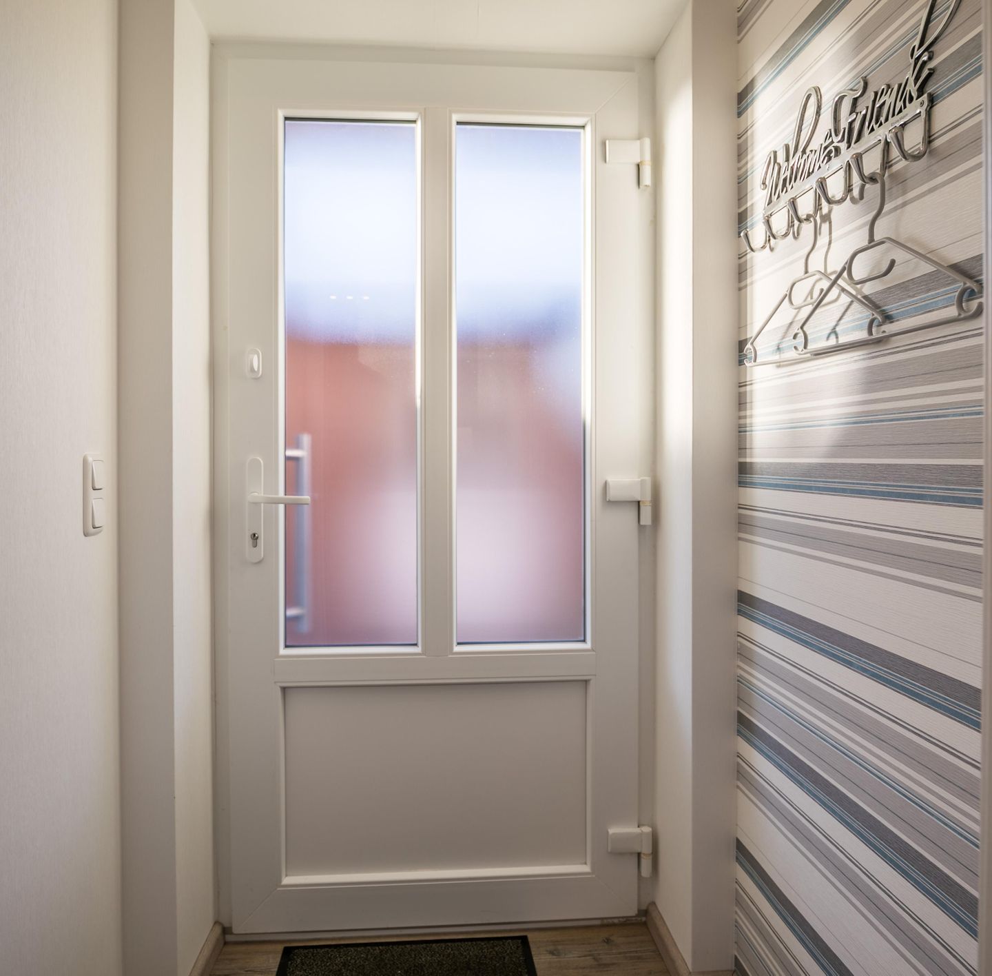 Muschelkorb Wohnungseingang