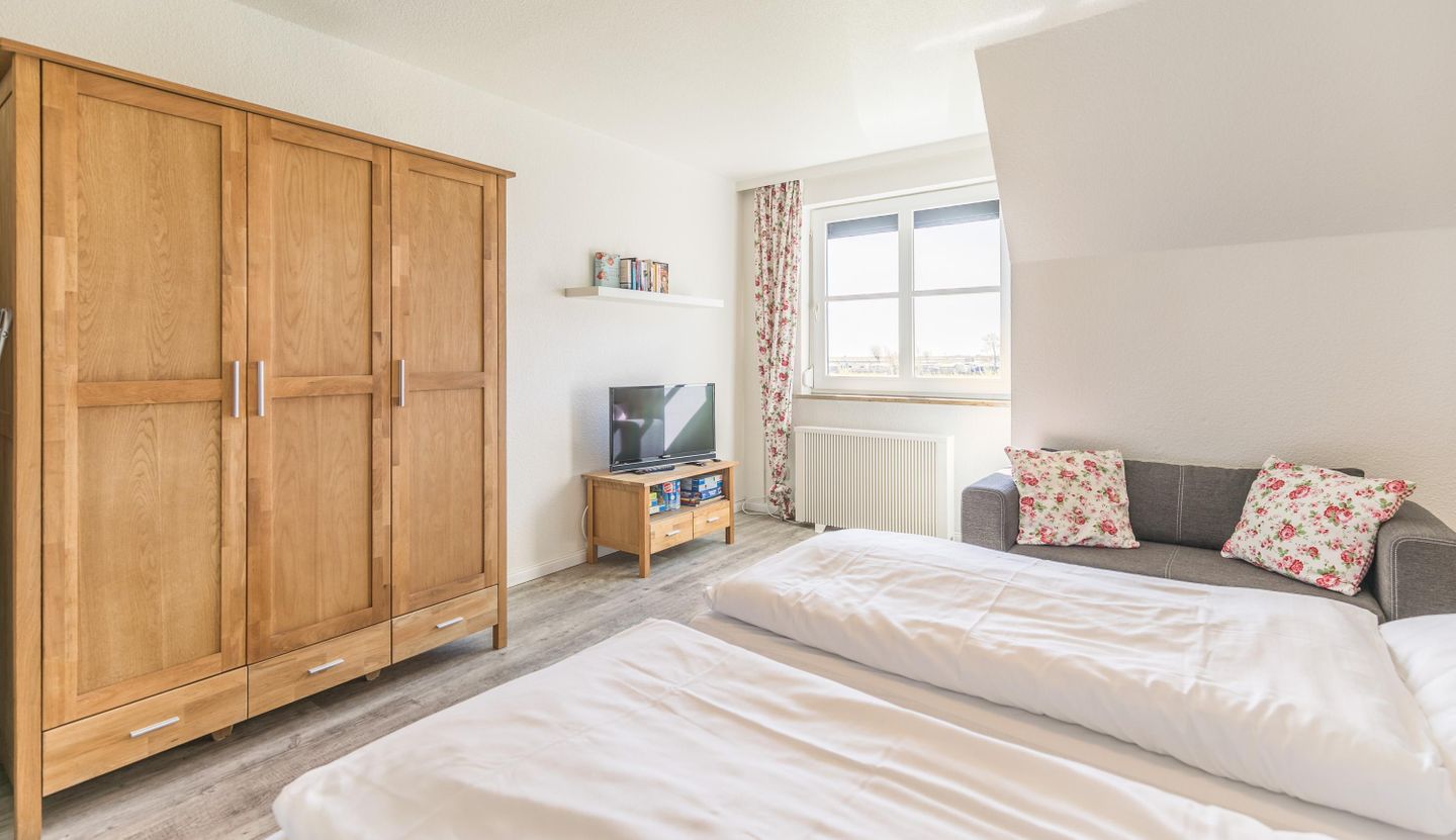 Ferienhaus Stinthus Schlafzimmer 1