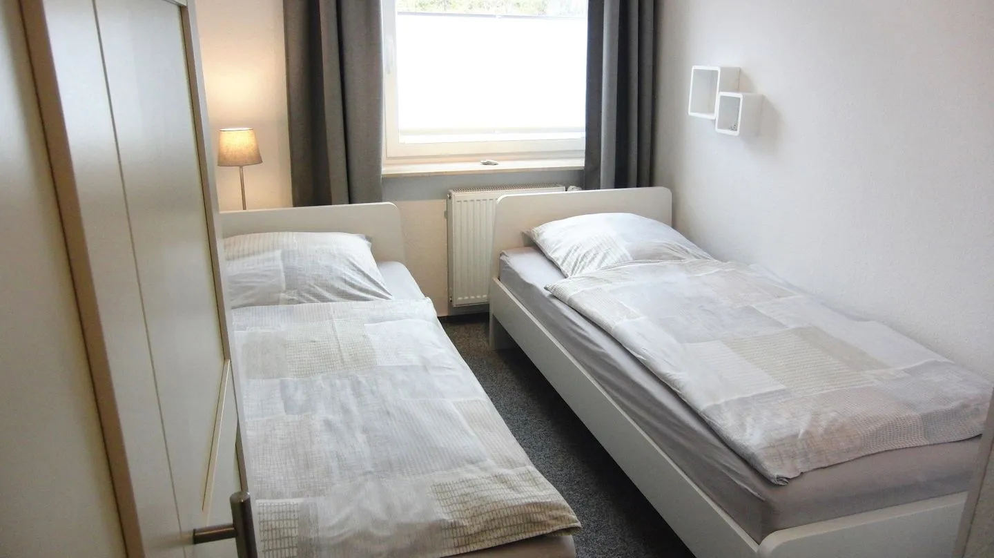Ferienwohnung *Meeresleuchten* Wittdün auf Amrum - Schlafzimmer 1 der Ferienwohnung Meeresleuchten in Wittdün auf Amrum