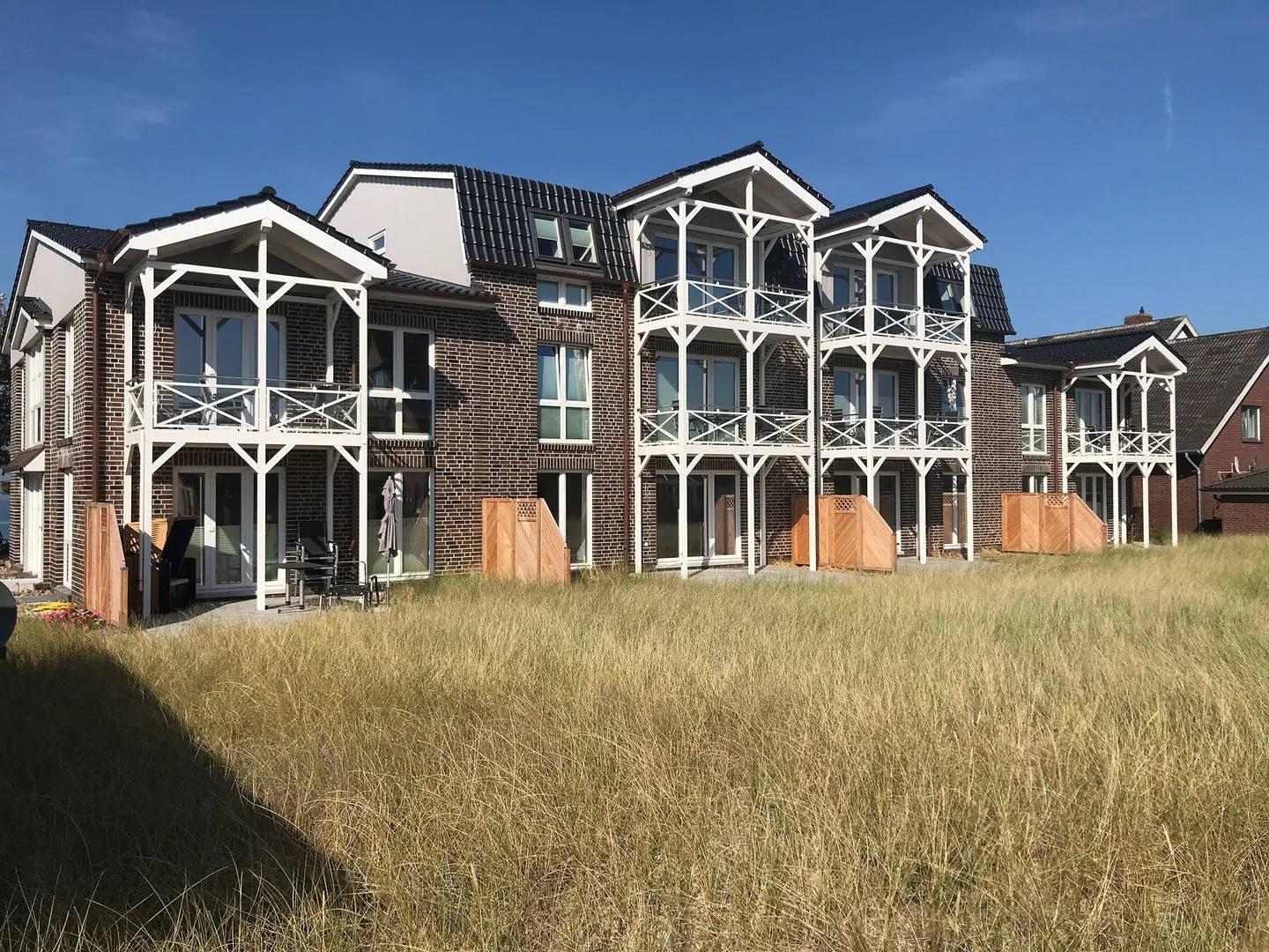 Haus *Weiße Düne* Ferienwohnung *Weiße Düne 3 / OceanView* Wittdün auf Amrum - Haus Rückseite