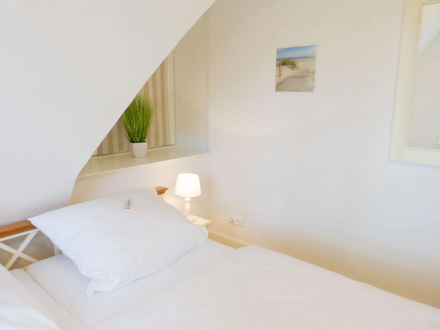 Heidehüs Friesenhaushälfte *Seepferdchen* Süddorf auf Amrum - Schlafzimmer in der Ferienwohnung Seepferdchen in Süddorf auf Amrum